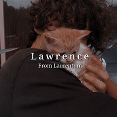 a woman holding an orange cat in her arms with the caption lawrence from laurentum