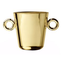 a gold colored cup with two handles