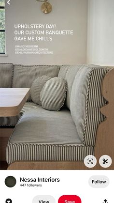 an image of a couch with pillows on it