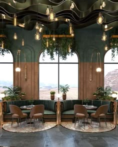 an artisticly designed restaurant with large windows and plants on the tables in front of them