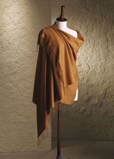 Yes, that really is the price. See why below... Our classic, lightweight 100% Vicuna Shawl. This beautiful shawl has a subtle diamond shaped pattern. This 100% Vicuna Shawl is made of the finest animal fiber in the world. Luxurious Vicuna is extremely light, amazingly soft, and provides unrivaled warmth. The shawl comes in a wooden box and includes a CITES certificate proving the fiber came from government controlled shearing operations on live animals. When we visited the mills the Vicuna proce Alpaca Shawl, Walls Room, Alpaca Wool, Shape Patterns, Mens Coats, Orange Color, Alpaca, High Low Dress, One Shoulder Dress