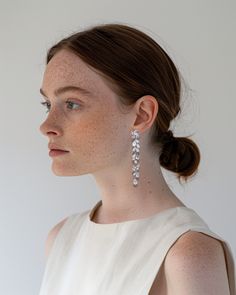 Make a statement with these stunning crystal dangle earrings, featuring cascading marquise and teardrop stones for a touch of refined elegance. Lightweight and versatile, they add just the right amount of sparkle, perfect for brides who want a timeless yet glamorous accessory on their big day. Wedding Earrings Bride, Statement Wedding Earrings, Statement Earrings Wedding, Bride Earrings, Crystal Dangle Earrings, Glam Wedding, Crystal Drop Earrings, Large Earrings, Crystal Drop