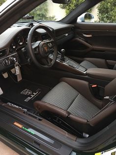 the interior of a sports car is clean and ready to be driven