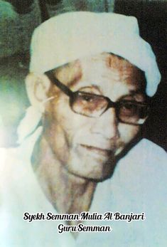 an old man wearing glasses and a white hat with words on it that read,