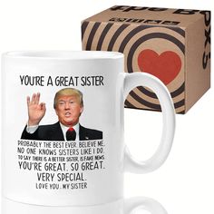 a coffee mug with the message you're a great sister on it and a box