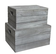 three wooden boxes stacked on top of each other with holes in the bottom and sides