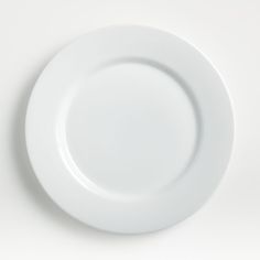 an empty white plate on a white background