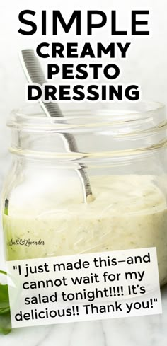 a jar filled with dressing sitting on top of a table