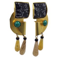 Fabulous Signed Gale Rothstein Designer Modernist Long Multi-Gem Dangle Earrings. 18K Gold plate over brass. Measuring approx. 2 1/2” long X 7/8” wide. Striking Abstract design. Signed on the back: GALE ROTHSTEIN II. Circa: 1980s. More Beautiful in real time...Sure to be admired complement to your outfit! Abstract Design, Clip On Earrings, Gold Plate, 18k Gold, Dangle Earrings, Jewelry Earrings, Gems, Brass, Signs