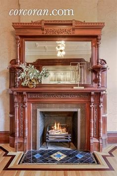 a fireplace with a mirror above it in a living room