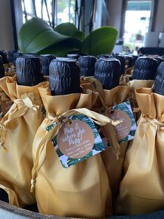 some black candles are wrapped in brown paper