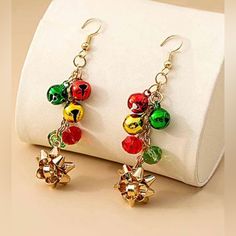 New In Package ~ Will Come In Gift Bag Red & Goldtone Jingle Bell Drop Earrings Perfect Holiday Accessory Product Description: Drop Earrings Styled With A Dangling Design Made Up Of Jingle Bells And Bows. 0.67" W Alloy Multicolor Earrings For Christmas Gift, Multicolor Earrings For Holiday Gifts, Holiday Multicolor Earrings Perfect For Gifts, Holiday Multicolor Earrings As A Gift, Holiday Multicolor Earrings As Gift, Red Jewelry For New Year Party, Red Jewelry For New Year's Party, Red New Year Party Jewelry, Gold Bamboo Earrings