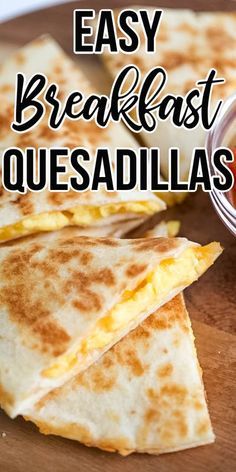 easy breakfast quesadillas on a cutting board with ketchup and mustard