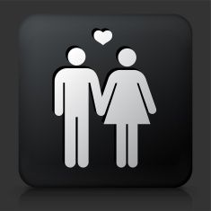 a black square button with a white silhouette of two people holding hands and a heart above them