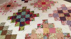 the quilts are laid out on the table