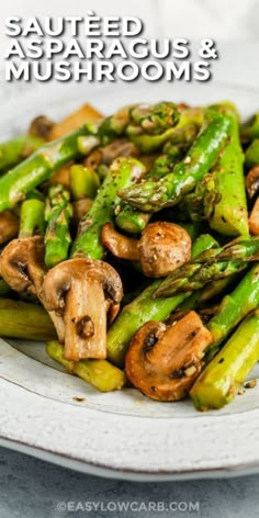 asparagus and mushrooms on a white plate with text overlay that reads sauteed asparagus & mushrooms