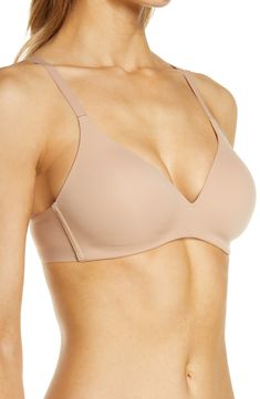 This seamless, wireless T-shirt bra disappears under clothing and features memory foam cups for a comfortable, contoured fit. Partially lined 55% nylon, 45% spandex Hand wash, dry flat Imported Fitted Seamless Nursing Bra No-show, Fitted Seamless Nursing Bra, Fitted Low-cut Sports Bra With Soft Touch, Low-cut Fitted Sports Bra With Soft Touch, Low-cut Fitted Nursing Bra With Soft Touch, Fitted Low-cut Nursing Bra With Soft Touch, Soft Touch Fitted Low-cut Nursing Bra, Low-cut Fitted Nursing Bra With Light Support, Fitted Low-cut Nursing Bra With Light Support