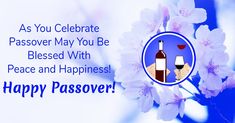 a happy passover card with two wine glasses and flowers