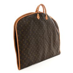 This is an authentic LOUIS VUITTON Monogram Garment Cover with 2 Hangers. This garment cover is crafted of classic Louis Vuitton monogram on coated canvas in brown with vachetta trim. It features vachetta rolled leather top handles and gold hardware including a hook to hang the garment cover. The crossover strap opens to a brown fabric interior with a full length zipper and includes 2 hangers. Louis Vuitton Monogram Bag, Louis Vuitton Travel, Garment Cover, Louis Vuitton Damier Ebene, Monogram Bag, Brown Fabric, Cosmetic Pouch, Leather Top, Authentic Louis Vuitton