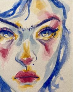 a watercolor painting of a woman's face