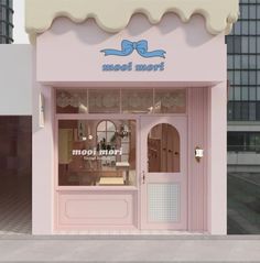 a pink store front with an awning over the door and windows that says from today