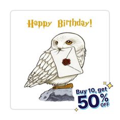 an owl holding a letter with the words happy birthday on it's chest and sitting on top of a rock