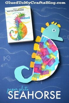 a paper plate seahorse next to a book on a blue background with the title