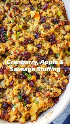 a white bowl filled with stuffing and cranberries