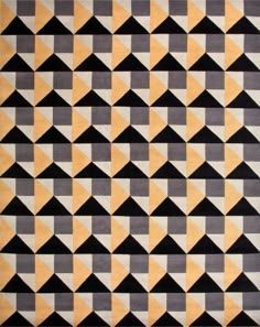 an area rug with black, yellow and white triangles on it's sides in various sizes