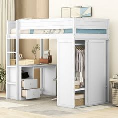 a white loft bed with a desk underneath it and drawers on the bottom shelf below