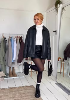 Black Mini Skirt Outfit Thanksgiving, Leather Jacket And Tights Outfit, Tall Black Boots Outfit Midsize, Skirt And Tights Outfit Midsize, Autumn Concert Outfit Ideas, Black Tights Outfit Midsize, Doc Martins Fall Outfit, Chelsea Boot And Skirt Outfit, Plaid Pencil Skirt Outfit Winter