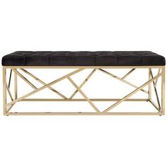 a black bench with gold legs and a black cushion on the top, in front of a white background