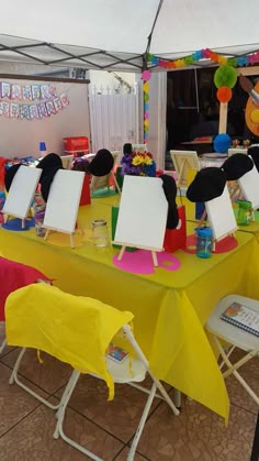 there are many chairs and tables set up for an event