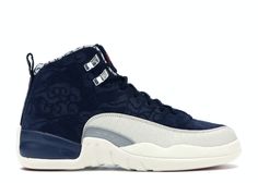 the nike air jordan xi is available in navy and white with an embellished upper