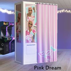 a pink dream machine with pictures on it