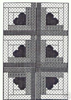 the cross is made up of squares with black and white designs on it, as well as