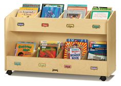 a children's book rack with books on wheels