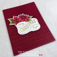 a christmas card with poinsettis on it