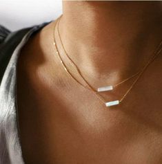 "Selenite Minimalist Crystal Necklace 14K Gold Plated Waterproof | Anti Tarnish | Made to order * Materials: 14K Gold Plated High Quality Stainless Steel or Silver Plated * Gemstone: GENUINE Selenite Crystal Pendant * Closure: Lobster clasp * Style: Minimalist * Chain Length Options: 14\", 16\", 18\" (Custom Lengths No Extra charge) Selenite Selenite is often used to remove energy blocks, stuck or stagnant energies from the etheric body. Its high vibrations cleanse the aura and activate the high Selenite Crystal Jewelry, Selenite Jewelry, Selenite Necklace, Etheric Body, Statement Necklace Gold, Minimalist Chain, Energy Blocks, High Vibrations, Selenite Crystal