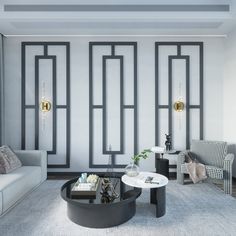 a modern living room with black and white decor on the walls, couches and coffee table