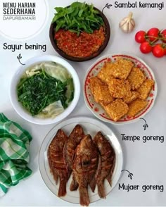 four plates with different types of food on them, including meats and vegetables in bowls