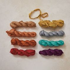 six different colors of yarn tied together