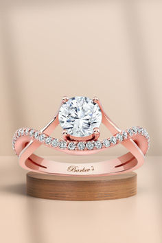 a rose gold engagement ring with an elegant twist