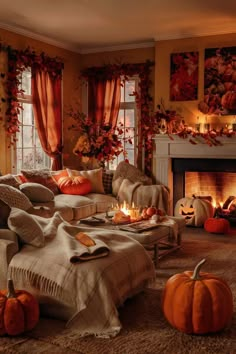 a living room filled with lots of furniture and pumpkins