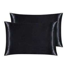 two black pillow cases on a white background, one is shiny and the other is plain