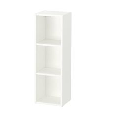 a white bookcase with three shelves on each side and one shelf above the other