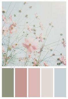 the color scheme is pale, pink and green with white flowers in it's center