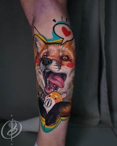 a tattoo with an image of a fox on it's leg and the word love is