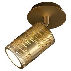 a gold colored light fixture on a white background, with the spotlight turned to the right