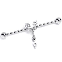 Product Details14 Gauge Clear CZ Gem Butterfly Delight Dangle Industrial Barbell 38mm Add some butterfly whimsy to your look with this 14 gauge helix barbell. It is made with a 1 1/2 inch 316L surgical grade stainless steel straight barbell with 5mm ball ends. It features a butterfly charm, embellished with textured detailing. It is set at the center with a clear cubic zirconia gem heart and features a clear cubic zirconia gem dangle. You can even slide it up and down the length of the barbell f Dream Piercings, Scaffold Piercing, Gem Butterfly, Types Of Ear Piercings, Barbell Earrings, Industrial Barbell, Industrial Piercing, Daith Piercing, 2000s Aesthetic